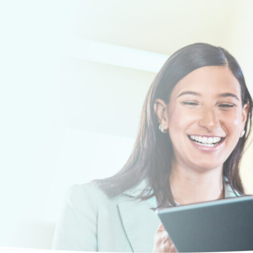 Two employees looking at the tablet